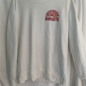 White Sweatshirt with Sunsets Logo